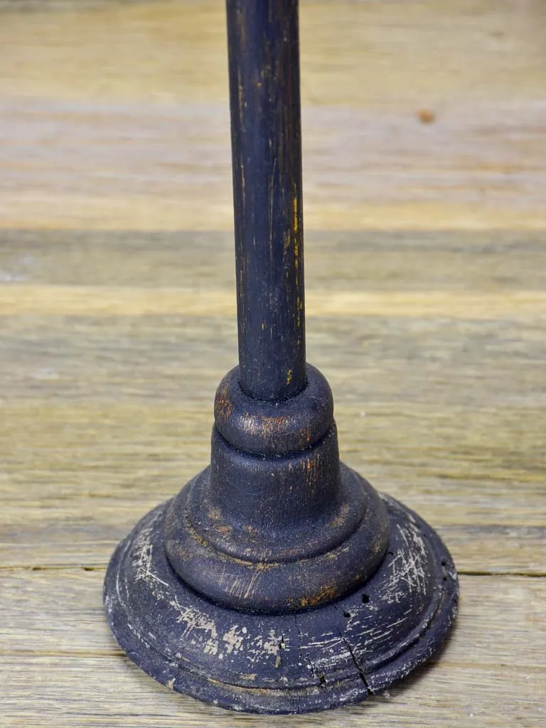 Two hat stands with black patina